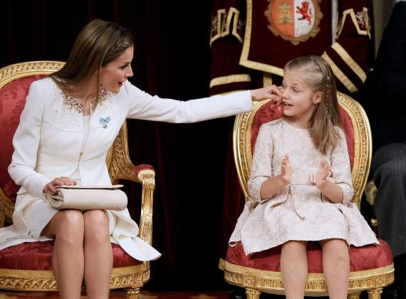Spain's Queen Letizia touches the cheek of her daughter Princess Leonor during the swearing-in ceremony for Spain's new King Felipe VI at the Congress of Deputies in Madrid