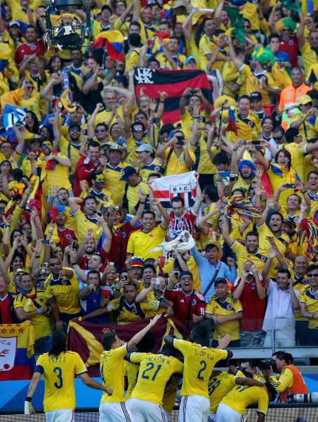 Colombia's players celebrate after James Rodriguez scored a goal against Greece during their 2014 World Cup Group C soccer match at the Mineirao stadium in Belo Horizonte