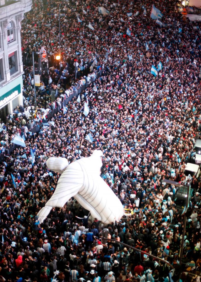 Argentina's fans celebrate their team winning the 2014 World Cup semi-finals against the Netherlands in Buenos Aires