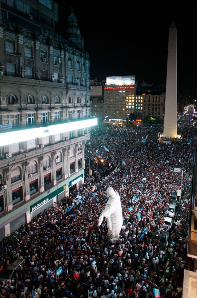 Argentina's fans celebrate their team winning the 2014 World Cup semi-finals against the Netherlands in Buenos Aires