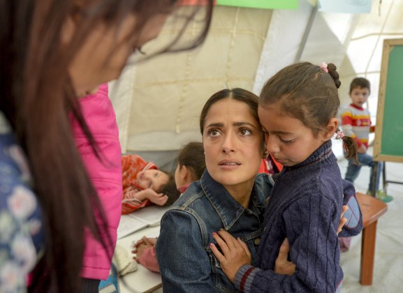 Movie star Salma Hayek meets with Syrian refugees during her visit with UNICEF to an informal settlement in the Bekaa valley