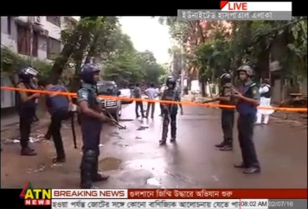 Armed personnel secure the scene after gunmen stormed the Holey Artisan restaurant and took hostages early on Saturday in Dhaka, Bangladesh in this still frame taken from live video July 2, 2016. Courtesy of ATN News/via REUTERS TV ATTENTION EDITORS - BANGLADESH OUT. NO COMMERCIAL OR EDITORIAL SALES IN BANGLADESH. THIS IMAGE WAS PROVIDED BY A THIRD PARTY. FOR EDITORIAL USE ONLY.NO RESALES. NO ARCHIVE. TPX IMAGES OF THE DAY