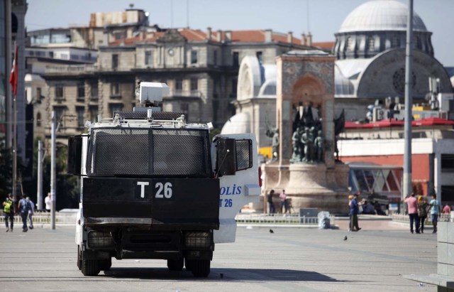 A police vehicle is parked beside the Republic Monument at Taksim Square in Istanbul after an attempted coup in Turkey, July 16, 2016. REUTERS/Kemal Aslan