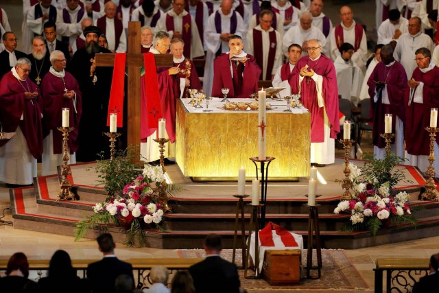 Archbishop of Rouen and Primate of Normandy Mgr Dominique Lebrun prays during a funeral service to slain French parish priest Father Jacques Hamel at the Cathedral in Rouen, France, August 2, 2016. Father Jacques Hamel was killed last week in an attack on a church at Saint-Etienne-du-Rouvray near Rouen that was carried out by assailants linked to Islamic State.   REUTERS/Charly Triballeau/Pool