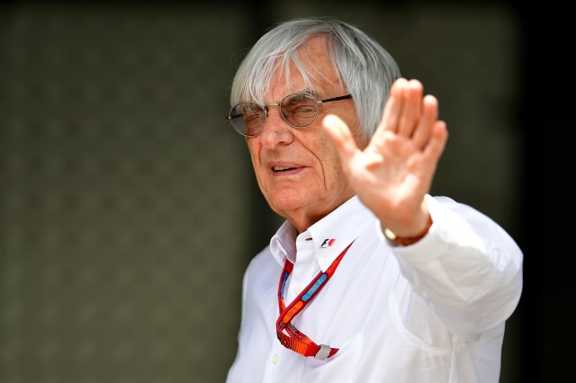 (FILES) This file photo taken on June 18, 2016 shows Formula 1 boss Bernie Ecclestone walking in the paddock at the Baku City Circuit, in Baku, one day ahead of the European Formula One Grand Prix.  Bernie Ecclestone, ousted as Formula One chief by its new American owner, transformed grand prix racing into one of the most profitable sports and made himself a billionaire powerbroker. His rule came crashing down on January 23, 2017  when Liberty Media completed its multi-billion-dollar takeover of the sport and appointed American Chase Carey as chairman and chief executive, elbowing Ecclestone aside with title of "chairman emeritus". / AFP PHOTO / ANDREJ ISAKOVIC