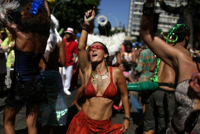 REFILE - ADDING DROPPED WORD Revellers take part in the annual block party Cordao de Boitata during pre-carnival festivities in Rio de Janeiro, Brazil February 19, 2017. REUTERS/Pilar Olivares
