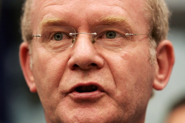 FILE PHOTO: Sinn Fein chief negotiator Martin McGuinness speaks about the Irish Republican Army's announcement during a visit to Capitol Hill in Washington, July 28, 2005. REUTERS/Kevin Lamarque/File Photo