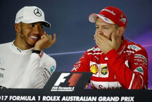 Los pilotos de Fórmula Uno, Lewis Hamilton (McLaren) y Sebastian Vettel (Ferrari). REUTERS/Brandon Malone