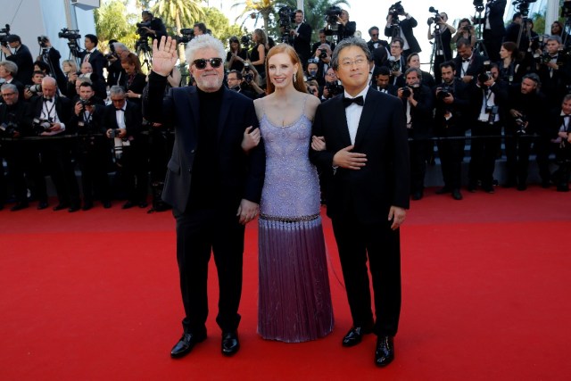 70th Cannes Film Festival - Screening of the film "Okja" in competition - Red Carpet Arrivals- Cannes, France. 19/05/2017. Director Pedro Almodovar, Jury President of the 70th Cannes Film Festival, and Jury members Jessica Chastain and Park Chan-wook pose. REUTERS/Stephane Mahe