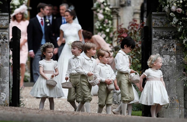 Britain's Prince George stands with other flower boys and girls after the wedding of Pippa Middleton and James Matthews at St Mark's Church in Englefield, Britain May 20, 2017. Pippa Middleton is the sister of Catherine, Duchess of Cambridge.  REUTERS/Kirsty Wigglesworth/Pool