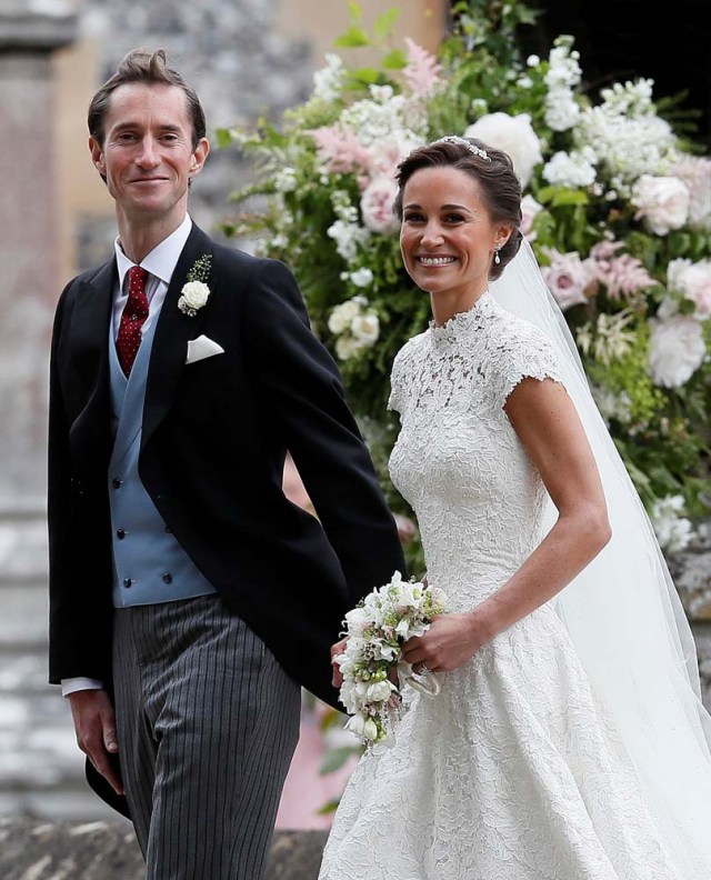 Pippa Middleton and James Matthews smile after their wedding at St Mark's Church in Englefield, Britain May 20, 2017. Pippa Middleton is the sister of Catherine, Duchess of Cambridge.  REUTERS/Kirsty Wigglesworth/Pool