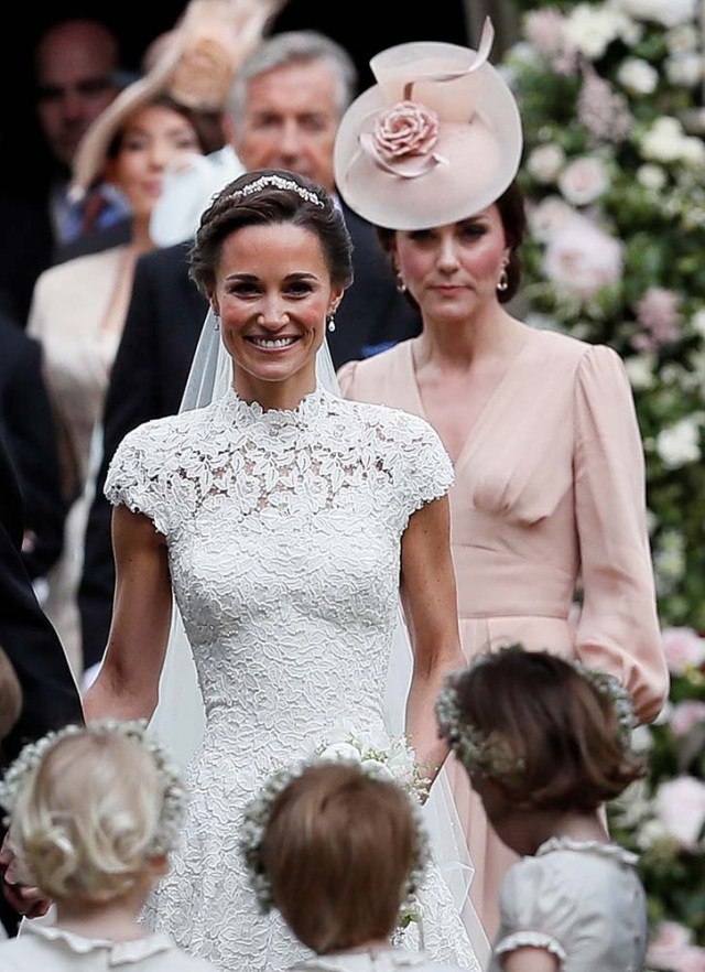 Britain's Catherine, Duchess of Cambridge follows the bride, her sister Pippa Middleton, after her wedding to James Matthews at St Mark's Church in Englefield, west of London, on May 20, 2017.    REUTERS/Kirsty Wigglesworth/Pool