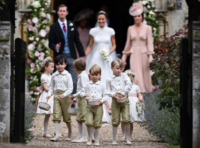 Britain's prince George, a pageboy, reacts following the wedding of his aunt Pippa Middleton to her new husband James Matthews, at St Mark's Church in Englefield, Britain on May 20, 2017.    REUTERS/Justin Tallis/Pool