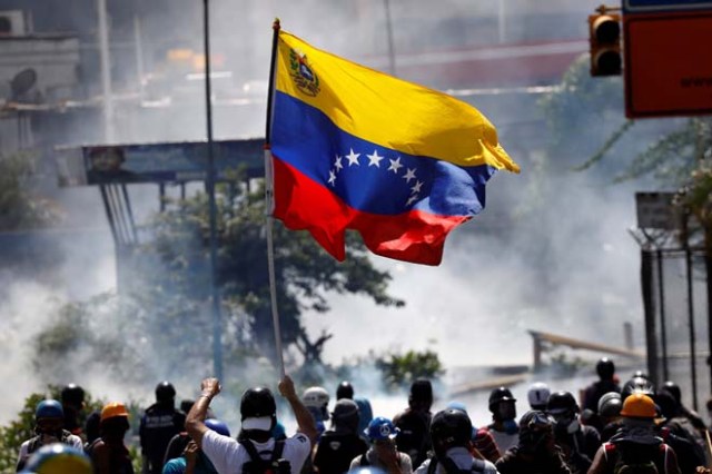 En Venezuela no se ha perdido la esperanza... Estas FOTOS lo demuestran. REUTERS/Carlos Garcia Rawlins