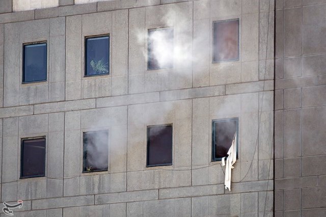 Smoke is seen during an attack on the Iranian parliament in central Tehran, Iran, June 7, 2017. Tasnim News Agency/Handout via REUTERS ATTENTION EDITORS - THIS PICTURE WAS PROVIDED BY A THIRD PARTY. FOR EDITORIAL USE ONLY. NO RESALES. NO ARCHIVE.