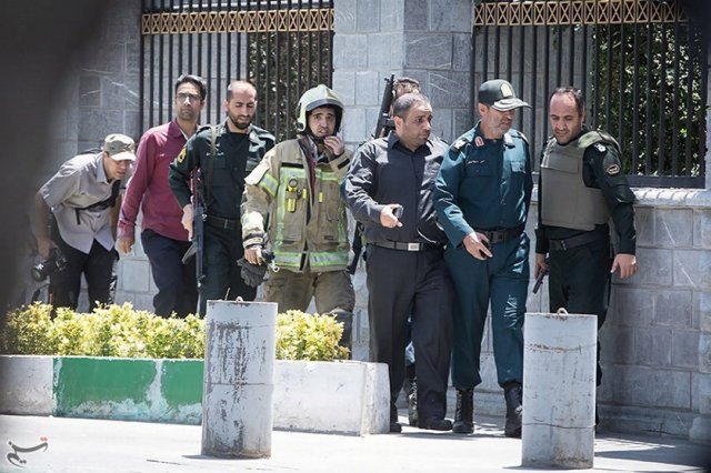 Members of Iranian forces are seen during an attack on the Iranian parliament in central Tehran, Iran, June 7, 2017. Tasnim News Agency/Handout via REUTERS ATTENTION EDITORS - THIS PICTURE WAS PROVIDED BY A THIRD PARTY. FOR EDITORIAL USE ONLY. NO RESALES. NO ARCHIVE.