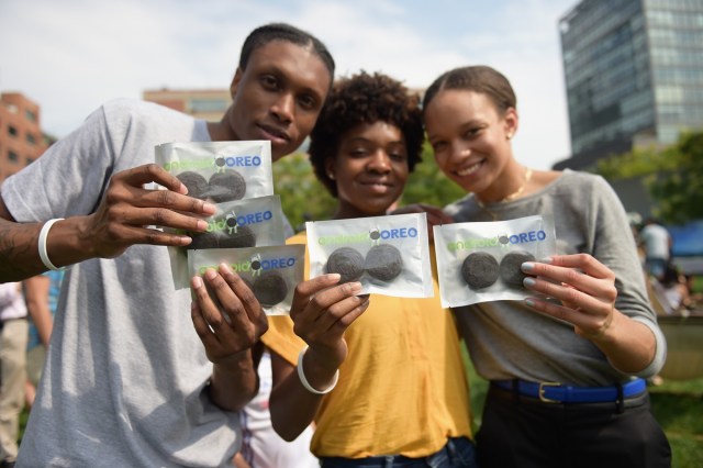 NEW YORK, NY - AUGUST 21: Guests enjoy Oreo cookies as Google and Oreo reveal Android OREO during the solar eclipse at the 14th street park on August 21, 2017 in New York City.   Jason Kempin/Getty Images for Oreo/AFP