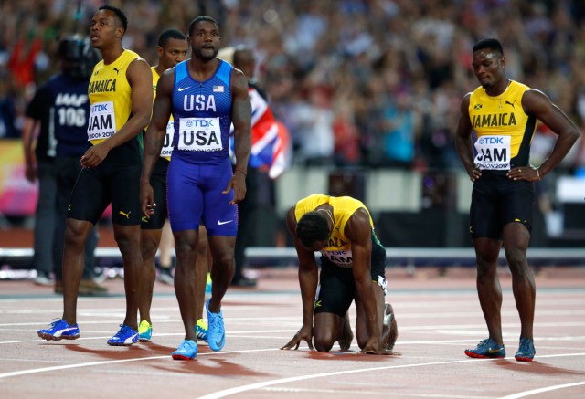 Athletics - World Athletics Championships - Men's 100 Metres Relay Final - London Stadium, London, Britain – August 12, 2017. Justin Gatlin of the U.S. and Usain Bolt of Jamaica react after the final. REUTERS/Phil Noble