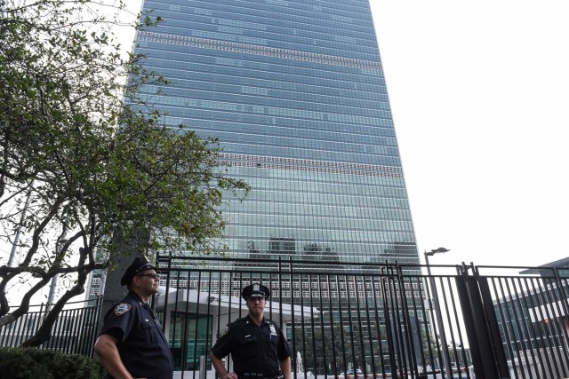 Members of the New York City police department stand guard in front of the United Nations building in New York City, U.S. September 17, 2017. REUTERS/Stephanie Keith