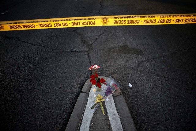 Flowers are pictured near the site of the mass shooing at the Route 91 Harvest Country Music Festival on the Las Vegas Strip in Las Vegas, Nevada, U.S., October 3, 2017. REUTERS/Chris Wattie