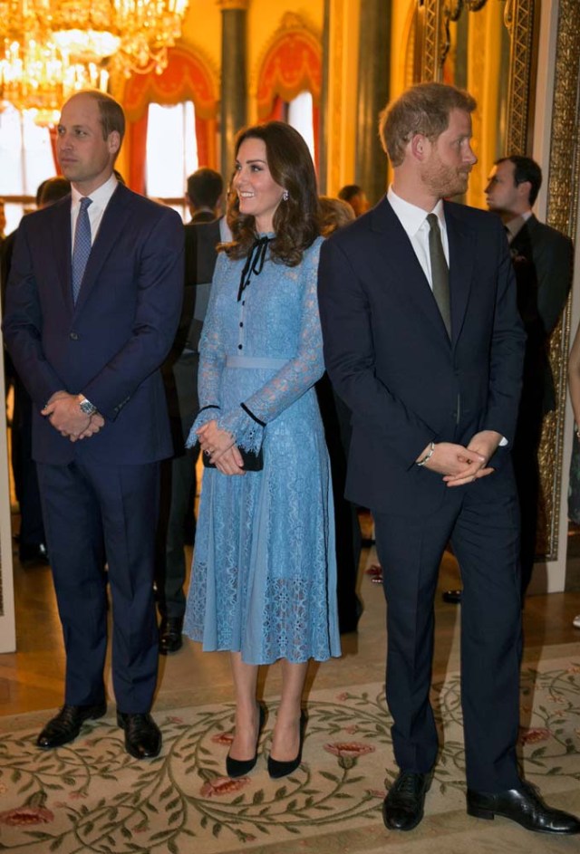 Britain's Prince William, Duke of Cambridge, Catherine Duchess of Cambridge and Prince Harry celebrate World Mental Health Day at Buckingham Palace in London, Britain, October 10, 2017. REUTERS/ Heathcliff O'Malley/Pool
