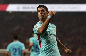 Atlético y Barcelona empatan con goles de Saúl y Luis Suárez