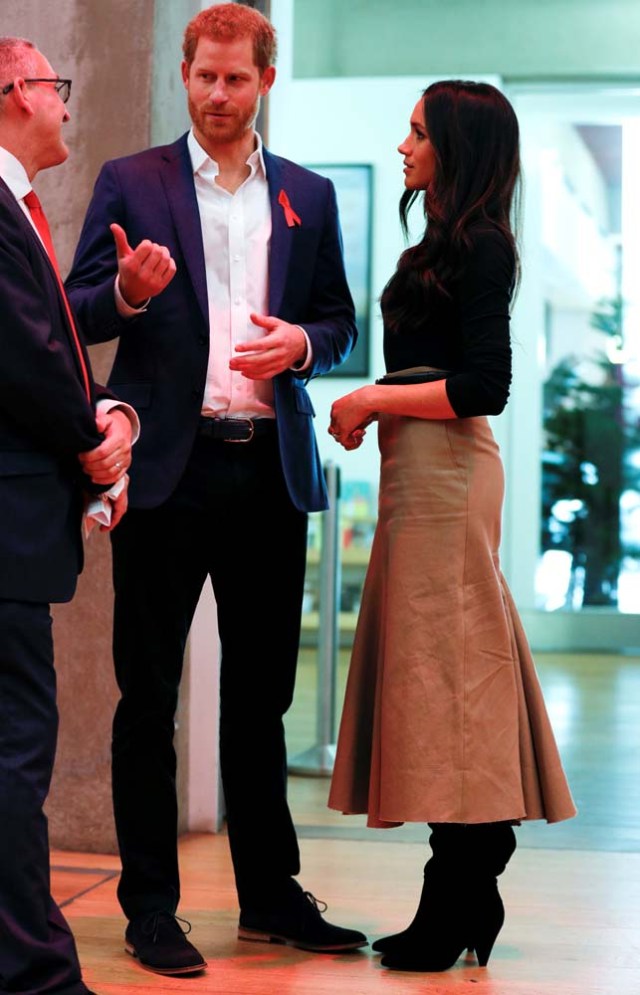 Britain's Prince Harry and his fiancee Meghan Markle visit the Terrence Higgins Trust World AIDS Day charity fair at Nottingham Contemporary in Nottingham, Britain, December 1, 2017. REUTERS/Adrian Dennis/Pool