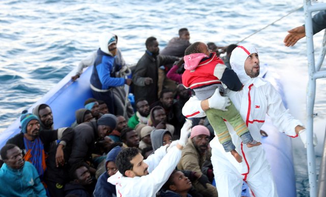 Migrants are rescued by Libyan coast guards off the coast of Garabulli, east of Tripoli, Libya, January 8, 2018. REUTERS/Hani Amara