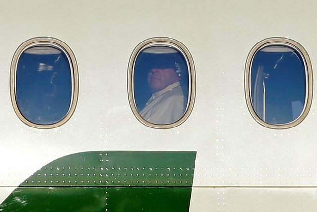 Pope Francis is seen aboard a plane for his trip to Chile and Peru at Fiumicino International Airport in Rome, Italy, January 15, 2018. REUTERS/Max Rossi