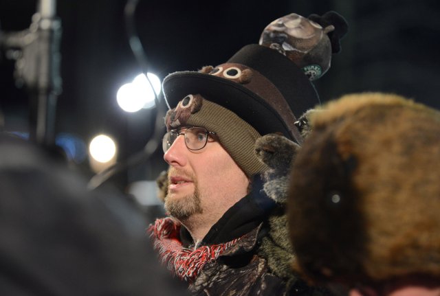 Ryan Teti, of Youngstown, Ohio, wears a groundhog hat while watching the festivities at Gobbler's Knob on the 132nd Groundhog Day in Punxsutawney, Pennsylvania, U.S. February 2, 2018. REUTERS/Alan Freed