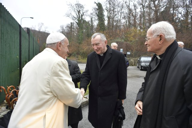 Pope Francis is welcomed, by Vatican Secretary of State Cardinal Pietro Parolin, as he arrives to make his lent spiritual exercises at the Divin Maestro house in Ariccia, south of Rome, Italy February 18, 2018. Osservatore Romano/Handout via Reuters ATTENTION EDITORS - THIS IMAGE WAS PROVIDED BY A THIRD PARTY.