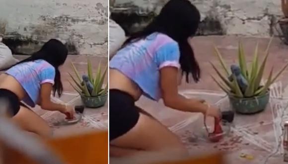 Mujer fue sorprendida in fraganti haciéndole el amarre del “agua de calzón” a su vecino (VIDEO)