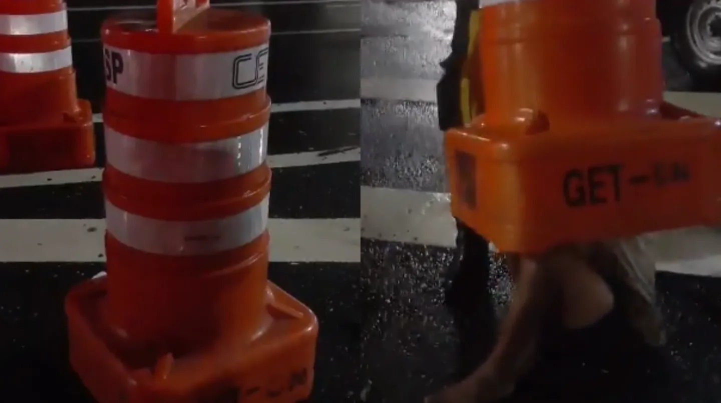 Insólito: Inspectores de tránsito encontraron a un hombre escondido dentro de un cono (VIDEO)